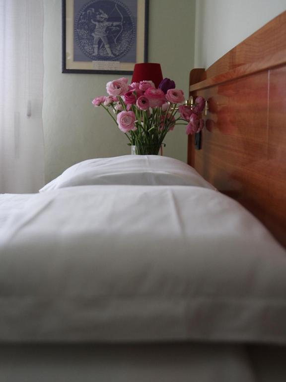 Postel nebo postele na pokoji v ubytování Hotel Trieste