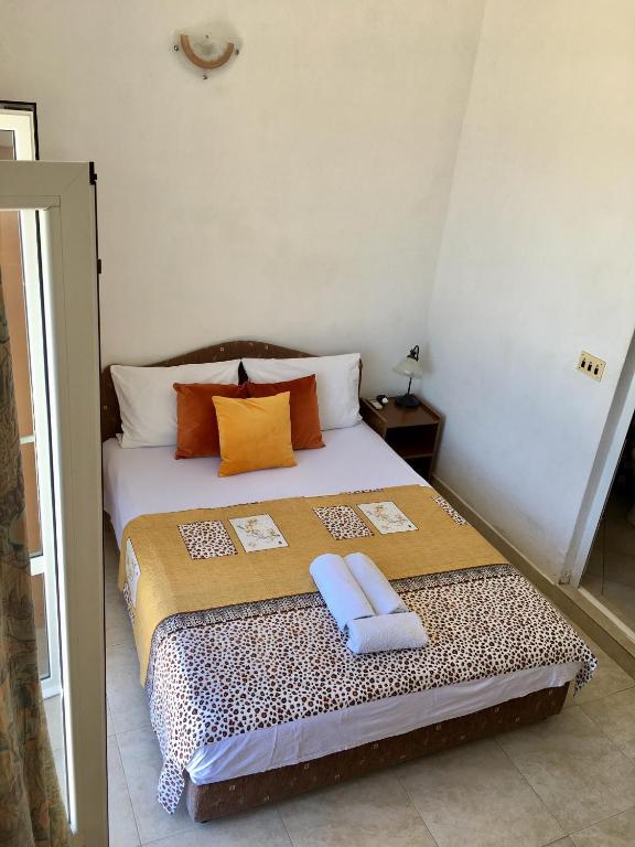 Postel nebo postele na pokoji v ubytování Paradiso Apartments - Liman1