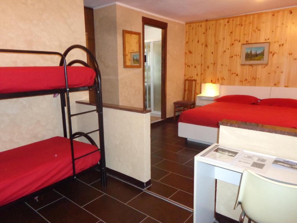 Postel nebo postele na pokoji v ubytování Hotel Edelweiss