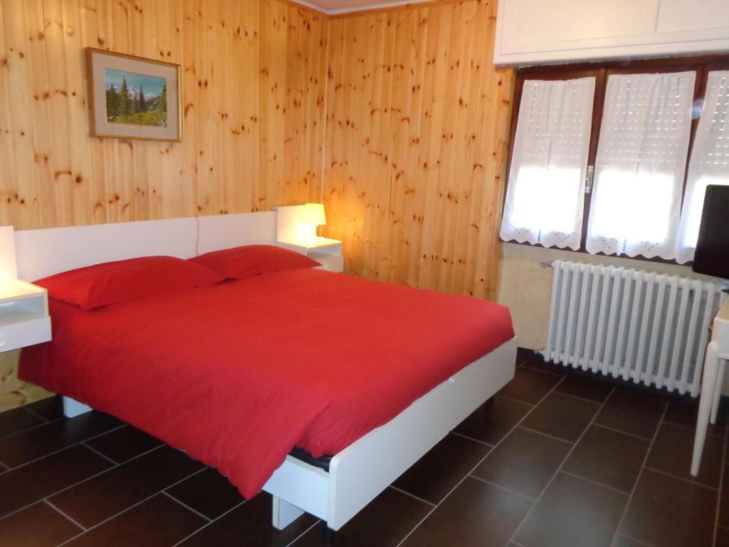 Postel nebo postele na pokoji v ubytování Hotel Edelweiss