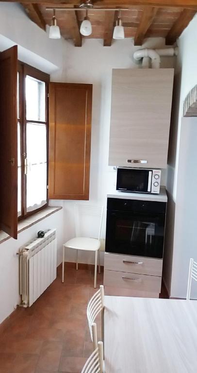 Kuchyň nebo kuchyňský kout v ubytování Casa dei Borghi
