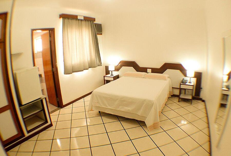Postel nebo postele na pokoji v ubytování Shalako Hotel