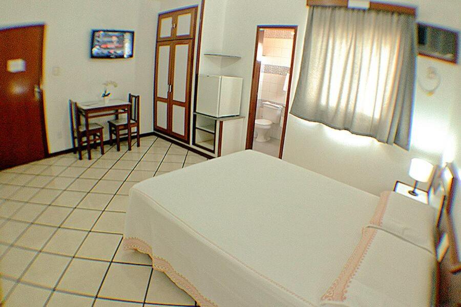 Postel nebo postele na pokoji v ubytování Shalako Hotel