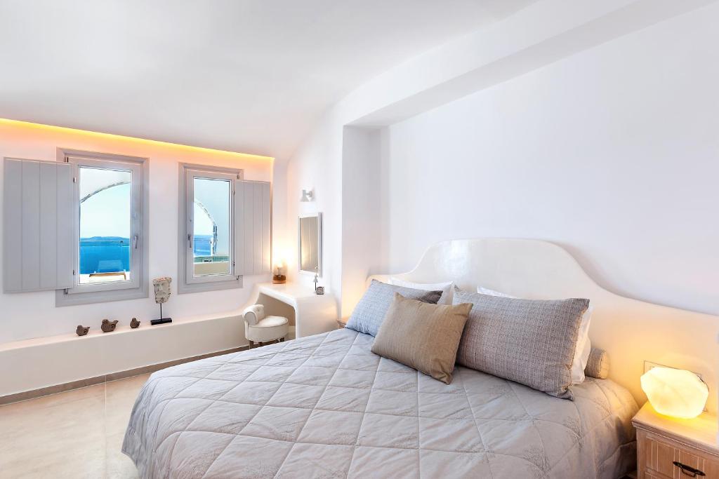 Voodi või voodid majutusasutuse Santorini Secret Premium toas