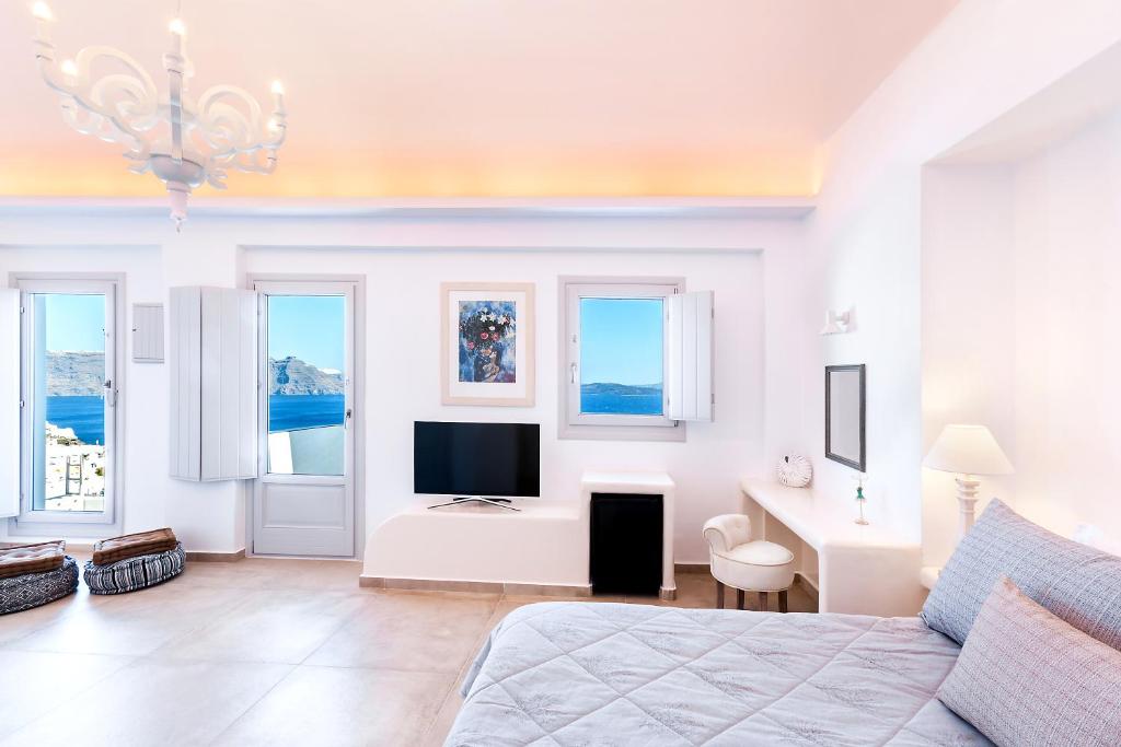 Televiisor ja/või meelelahutuskeskus majutusasutuses Santorini Secret Premium