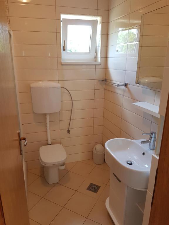 Koupelna v ubytování Apartments Dunja Malinska