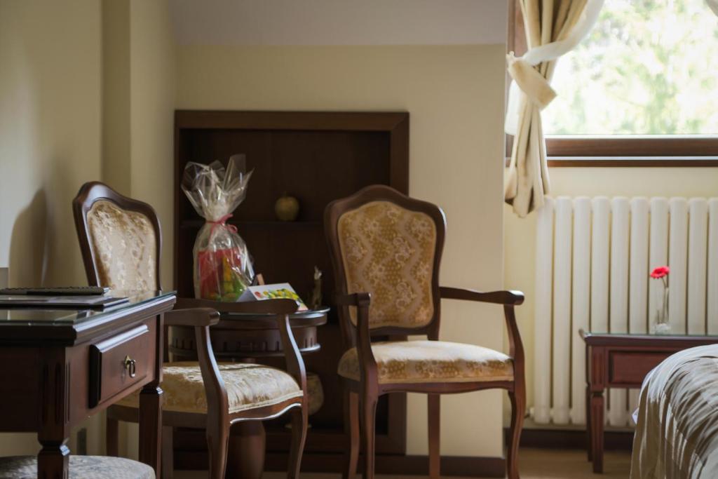 Posezení v ubytování Hotel Foisorul cu Flori