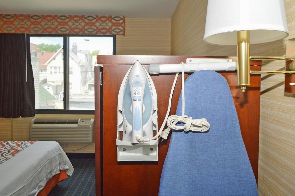 Postel nebo postele na pokoji v ubytování Corona Hotel New York - LaGuardia Airport