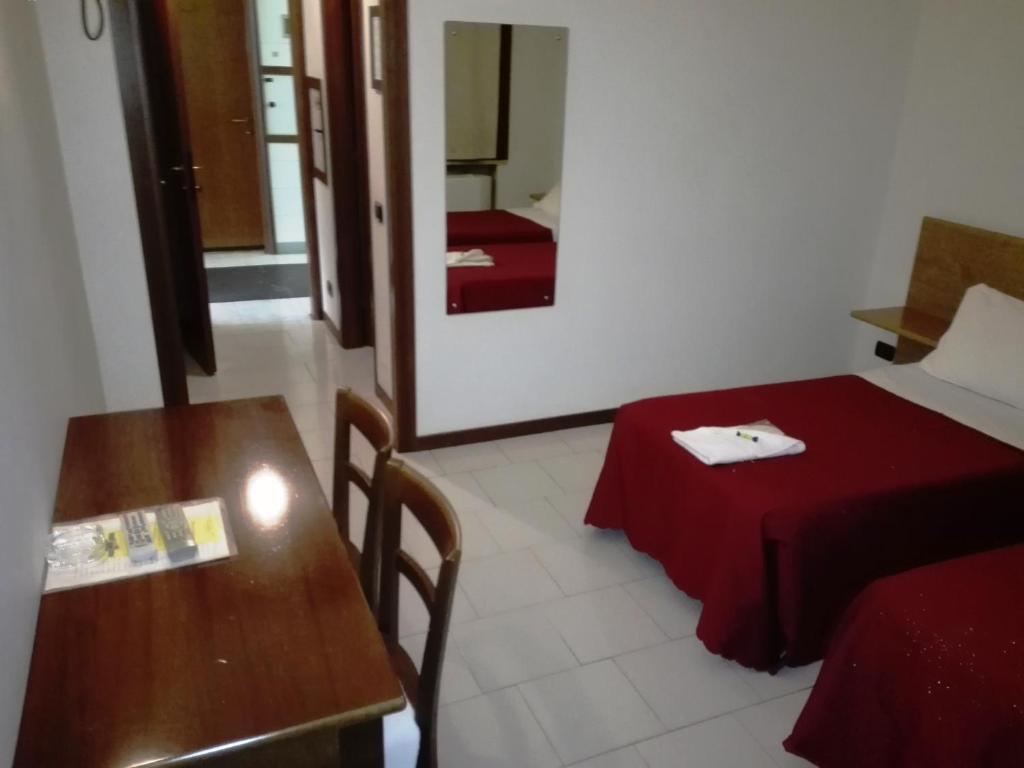 Postel nebo postele na pokoji v ubytování Hotel Motel Est
