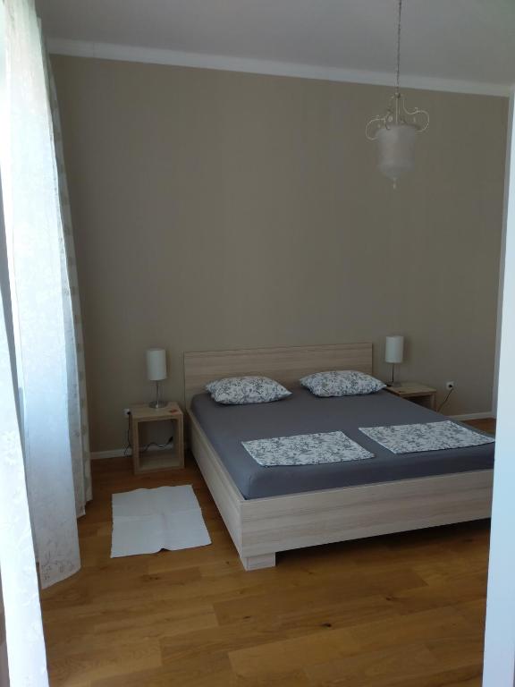 Postel nebo postele na pokoji v ubytování Aurelia Rooms