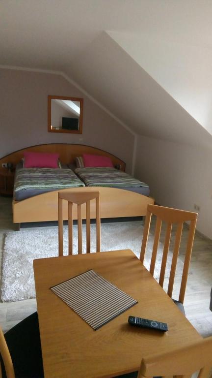 Postel nebo postele na pokoji v ubytování ApartmányDanielova