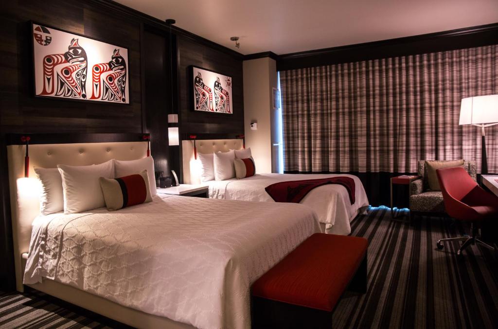 Postel nebo postele na pokoji v ubytování Tulalip Resort Casino