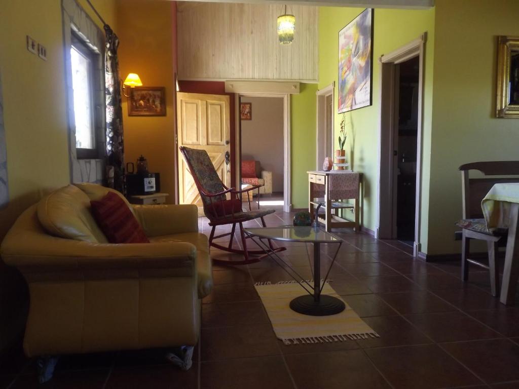 Area soggiorno di Regenbogen Bungalows