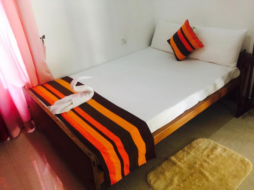 Postel nebo postele na pokoji v ubytování Disna Homestay