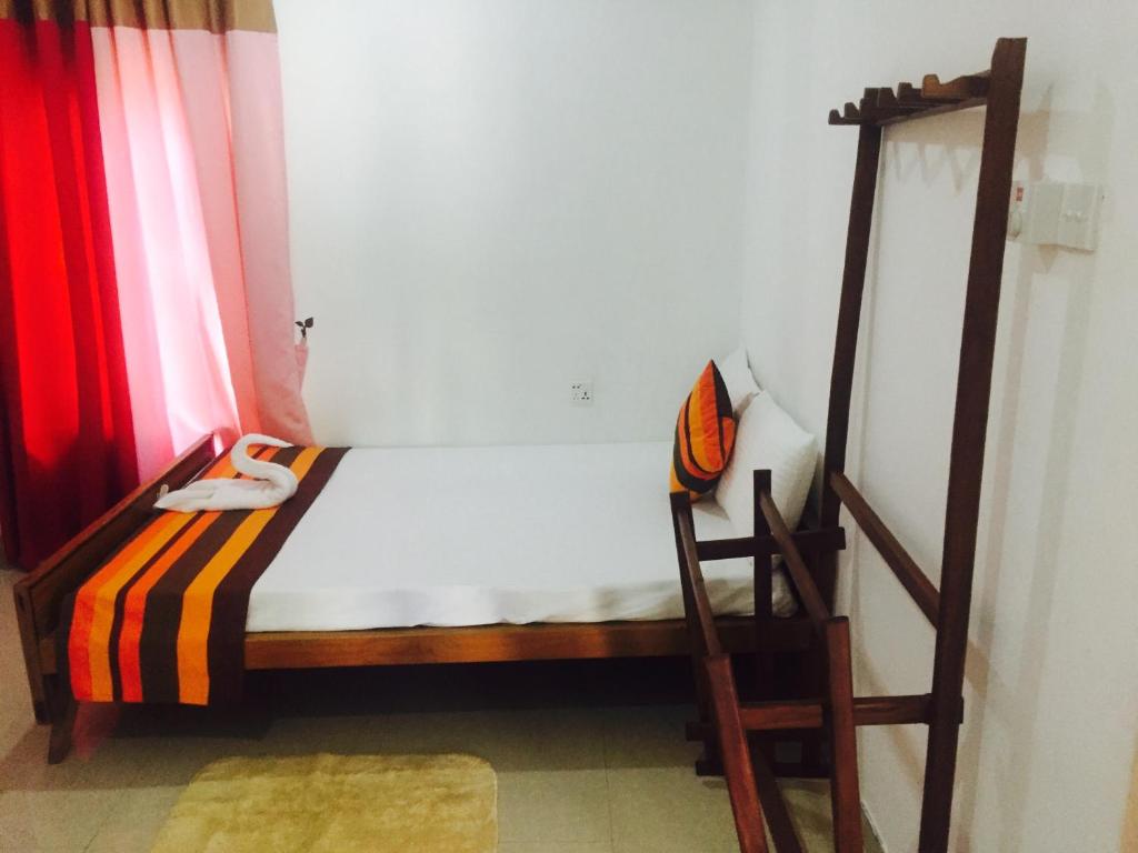 Postel nebo postele na pokoji v ubytování Disna Homestay