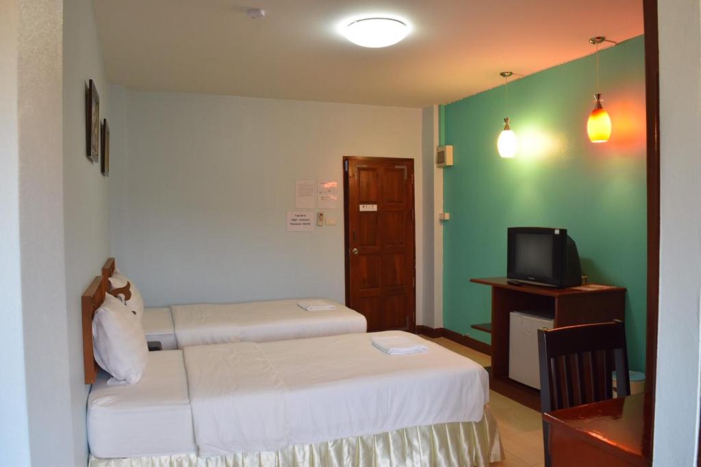 Postel nebo postele na pokoji v ubytování Memory Residence