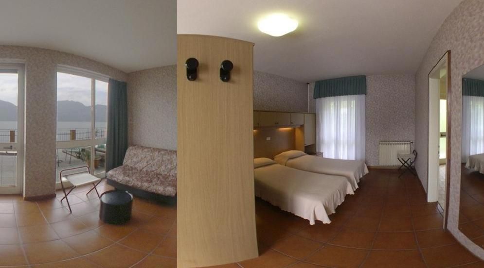 Postel nebo postele na pokoji v ubytování Hotel Nike
