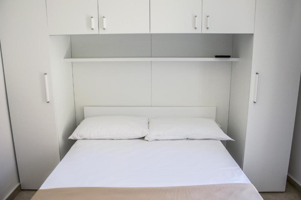 Posteľ alebo postele v izbe v ubytovaní Sunrise Guest House