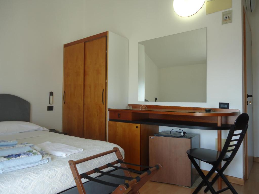 Postel nebo postele na pokoji v ubytování Hotel L&V