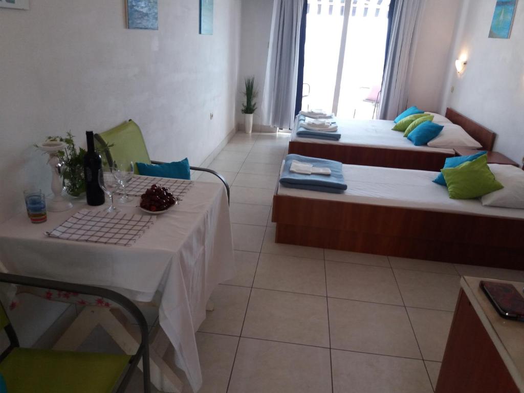 Posteľ alebo postele v izbe v ubytovaní Apartments Boris