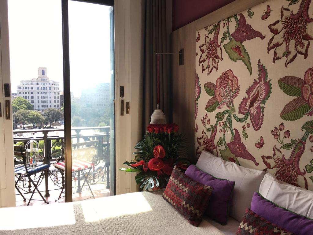 Posteľ alebo postele v izbe v ubytovaní Hotel Ginebra