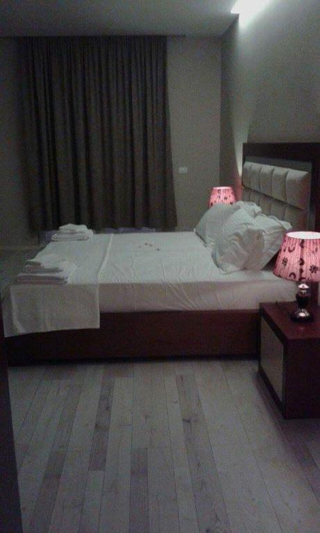 Postel nebo postele na pokoji v ubytování Hotel Magllara