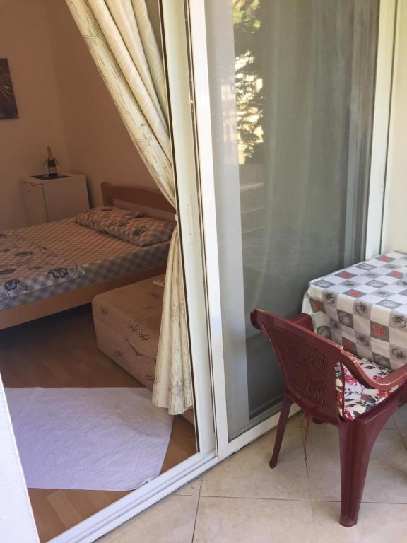 Postel nebo postele na pokoji v ubytování Tina Rooms