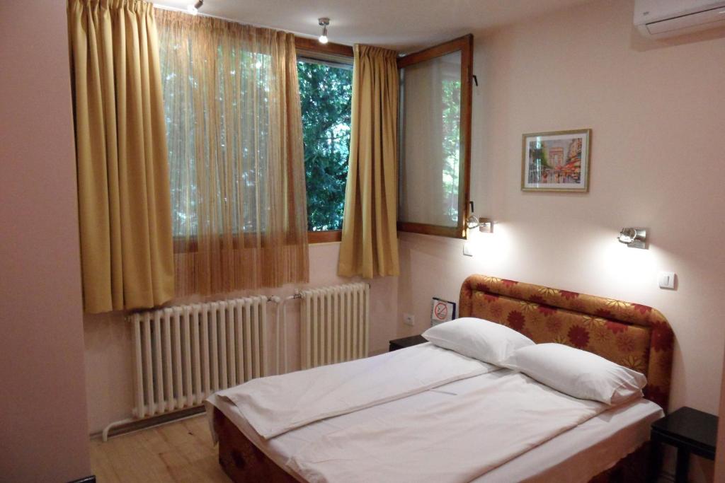 Postel nebo postele na pokoji v ubytování Hostel Oasis