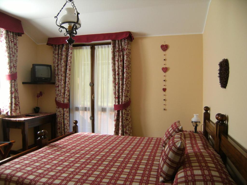Postel nebo postele na pokoji v ubytování Albergo Thurwieser