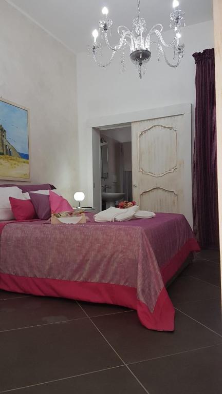 Postel nebo postele na pokoji v ubytování Baia Di Torre Squillace