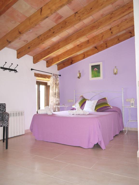 Кровать или кровати в номере Agroturismo Sa Duaia