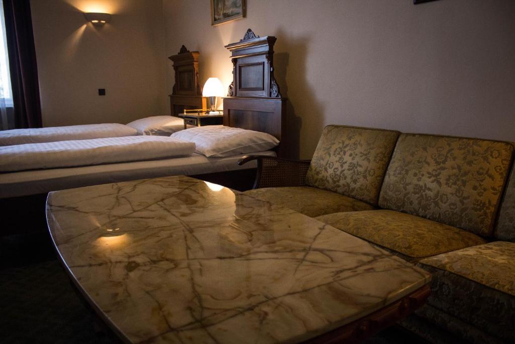 Postel nebo postele na pokoji v ubytování Hotel Continental