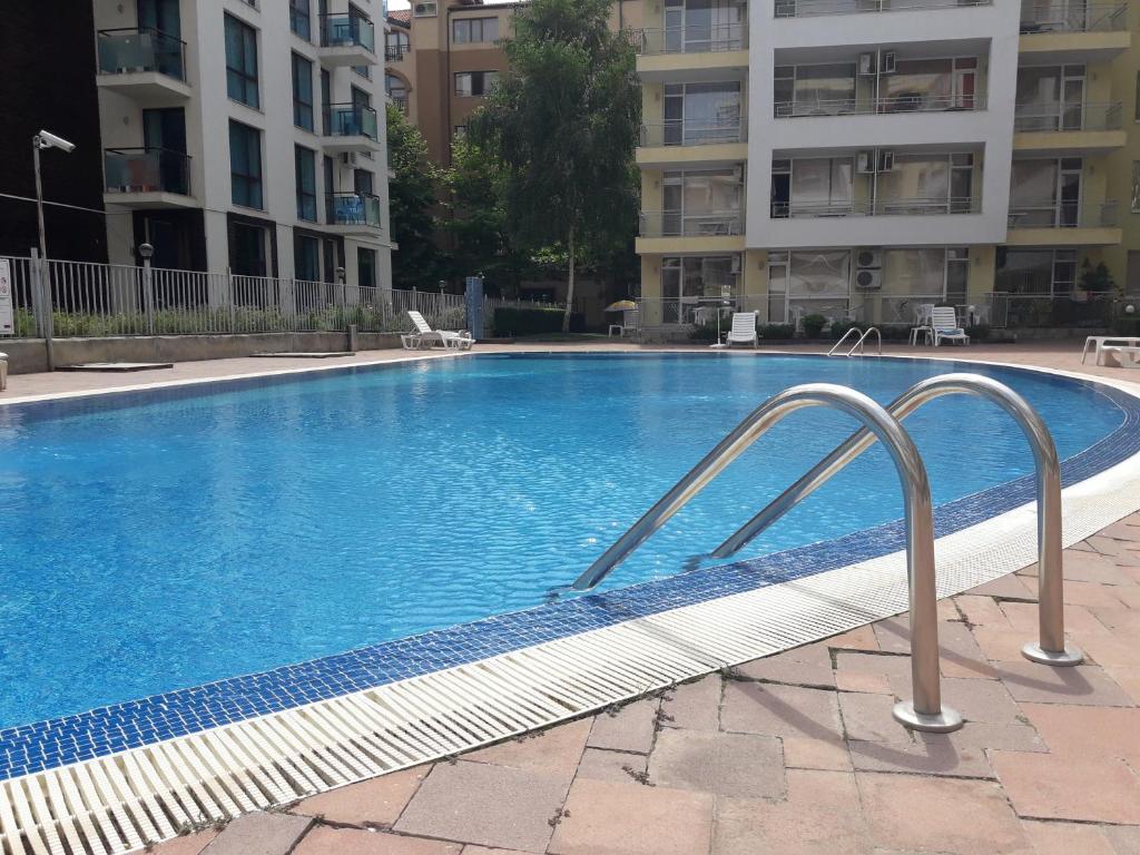 The swimming pool at or close to Economy Apartment in Sunset Beach 2 Complex