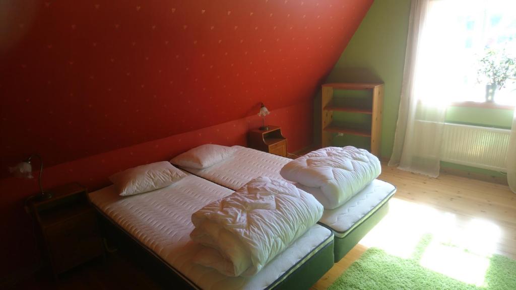 Postel nebo postele na pokoji v ubytování Torp Källtorp B&B