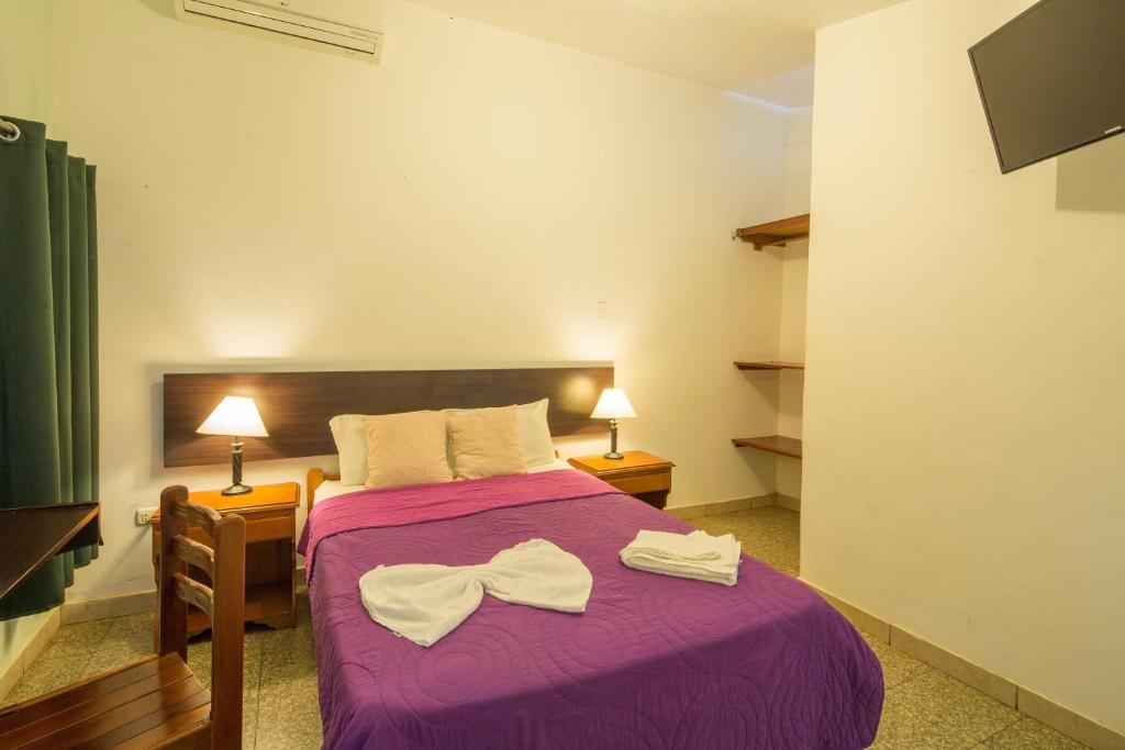 Postel nebo postele na pokoji v ubytování Bubinzana Magical Lodge