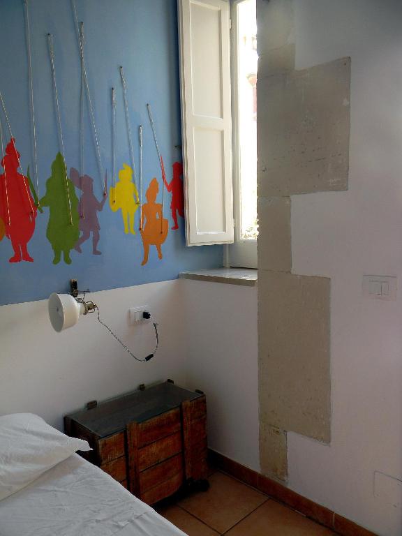 Postel nebo postele na pokoji v ubytování L'Acanto