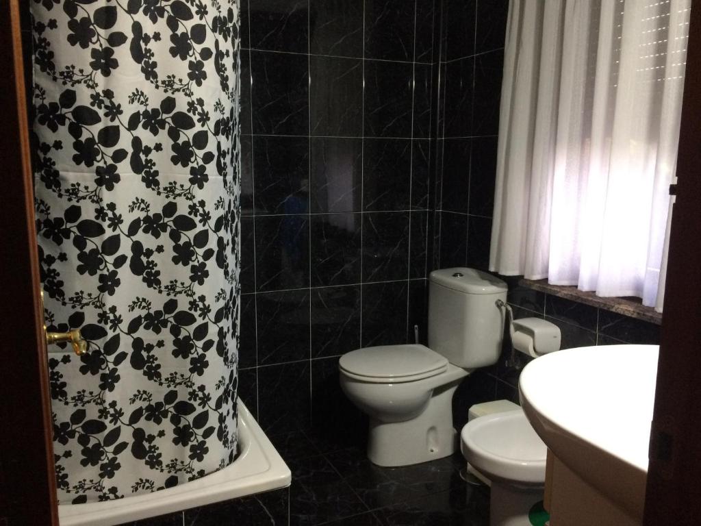 Koupelna v ubytování Pension Parrilla Casa Vicente