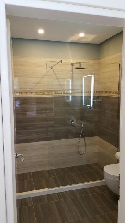 Koupelna v ubytování Hotel Magllara