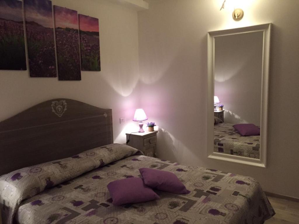 Postel nebo postele na pokoji v ubytování Casetta Lavanda