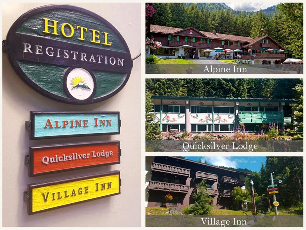 a group of four signs on a hotel at Crystal Mountain Hotels in Crystal Mountain