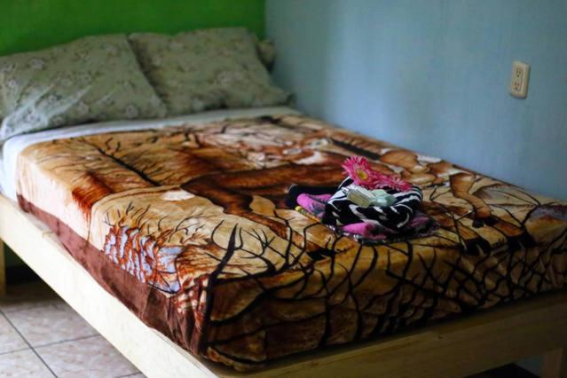 Cama o camas de una habitación en Posada Maná