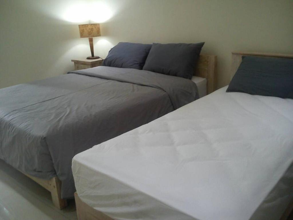 Cama o camas de una habitación en Umah Bagus