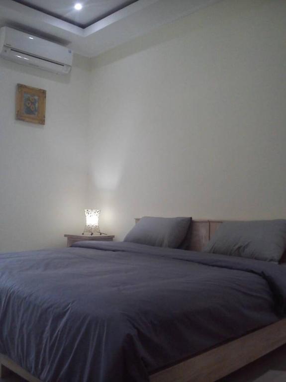 Cama o camas de una habitación en Umah Bagus