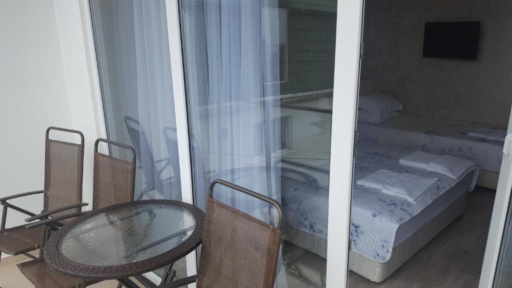 Postel nebo postele na pokoji v ubytování Hotel Del Mar