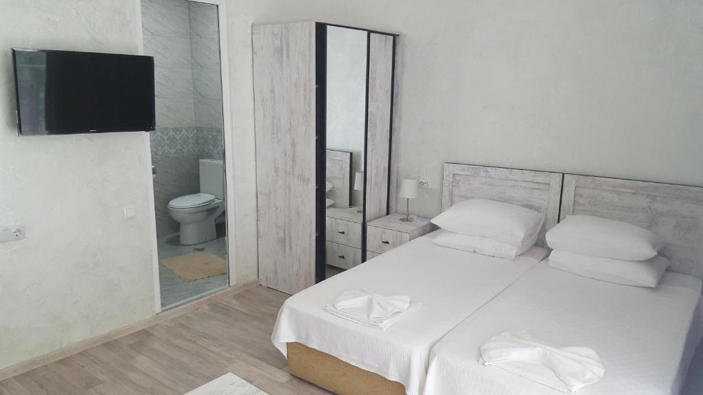 Postel nebo postele na pokoji v ubytování Hotel Del Mar