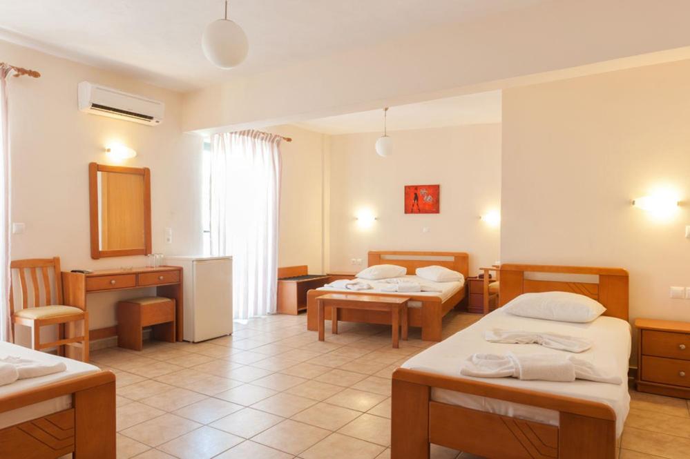 Postel nebo postele na pokoji v ubytování Ageri Hotel