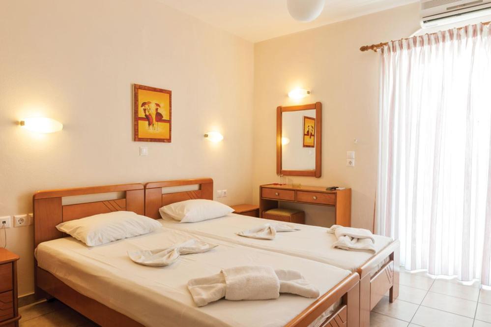 Postel nebo postele na pokoji v ubytování Ageri Hotel