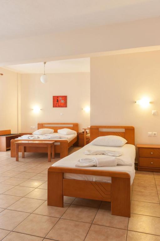 Postel nebo postele na pokoji v ubytování Ageri Hotel