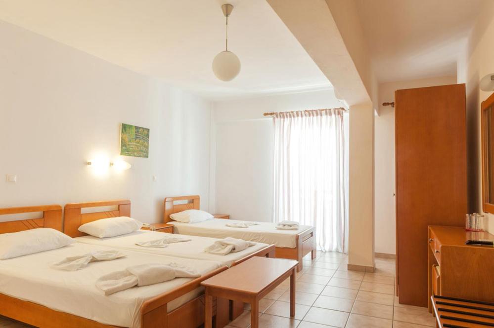 Postel nebo postele na pokoji v ubytování Ageri Hotel