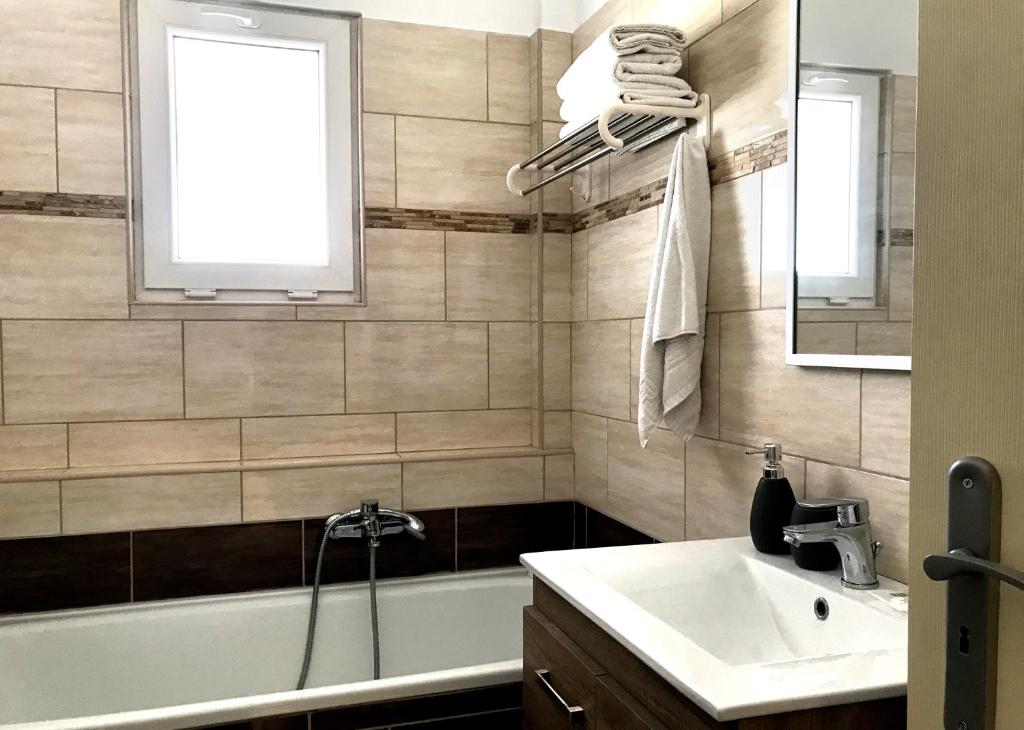 Ванная комната в Catamaran Corfu Aparthotel